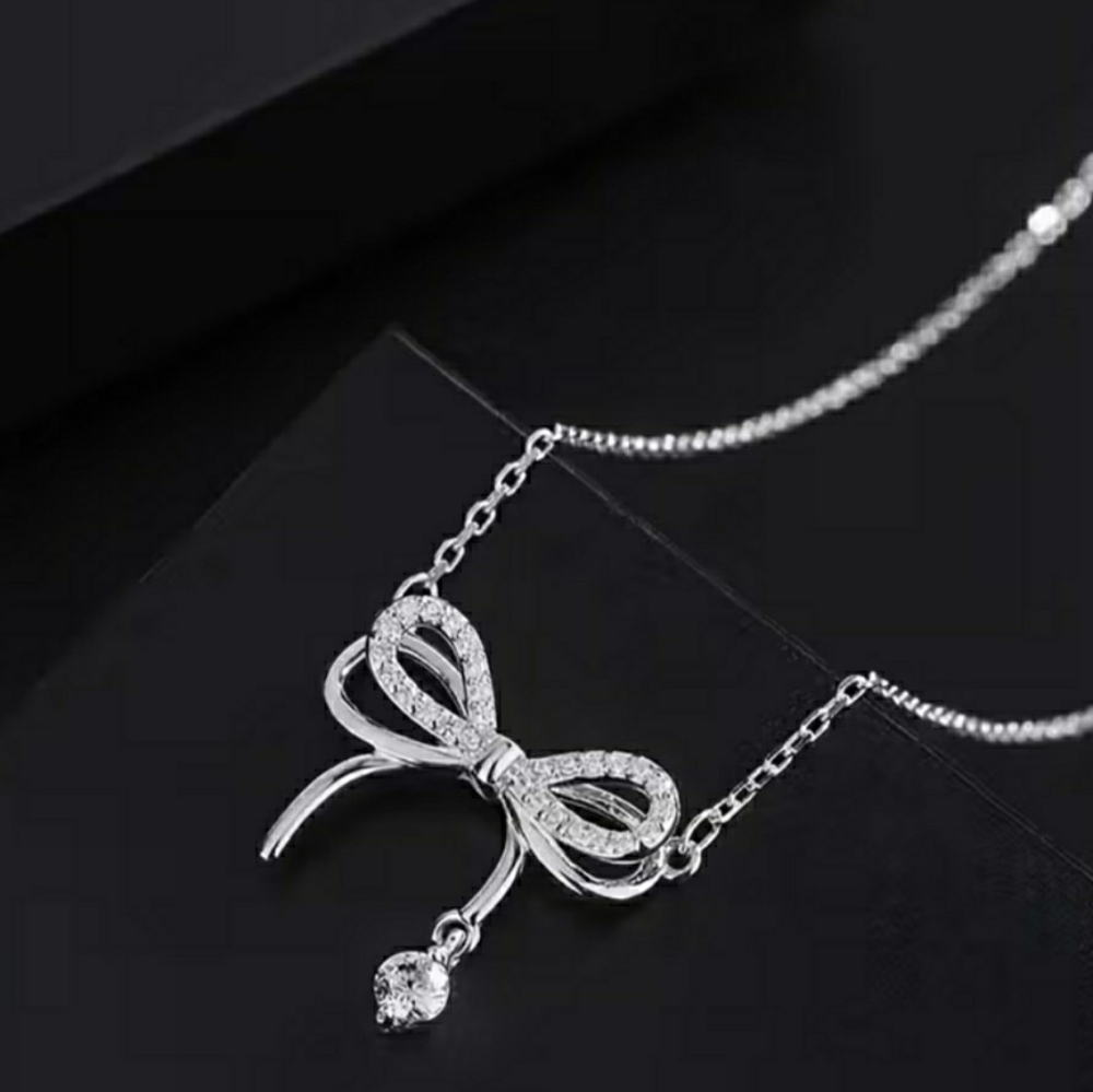 Elegant Silver Bow Pendant Necklace